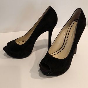 Enzo Angiolini Black suede peep toe pumps.